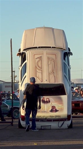 Lincoln Town Car LOWRIDER HOPPER GOING ALL THE WAY UP, STANDING ON BACK BUMPER at a hopping contest!