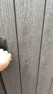 Completed composite driveway gate installation