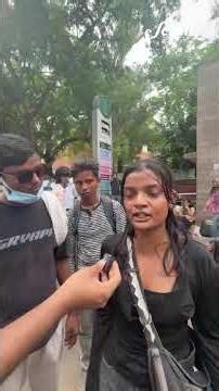 Protesters celebrate as Dharmendra Pradhan resigns