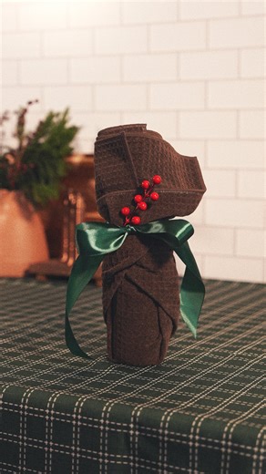 Geometry on Instagram: "You asked for it… here’s the wine bottle wrap tutorial 🍷✨ The perfect way to gift a Geometry towel this holiday season. #howto #geometryhouse #giftingideas"