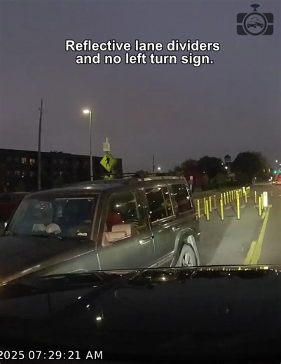 Reflective lane dividers and no left turn sign. | Dashcam Lessons