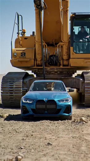 A massive world-record excavator uses giant steel cables to pull a blue BMW across the ground — tires screeching, smoke rising, and metal grinding as pure force meets precision engineering. The sound of steel tension, the roar of the machine, and the sight of raw power create a cinematic spectacle that’s both shocking and mesmerizing. 🎥 Captured in ultra-realistic 4K quality, this is not just a test of strength — it’s machine versus luxury, and the result will blow your mind! 💬 Comment below: 