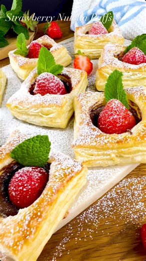 Izabella Jakubec on Instagram: "Strawberry Nutella Puffs… flaky, chocolatey and honestly dangerous 😍Crispy puff pastry, warm Nutella and juicy strawberries in every bite. These disappear FAST. Comment ‘puffs’ and I’ll send the recipe straight to your inbox 💌 Or find it on my website, link in bio🔗 If you love puff pastry bakes like this, my cookbook Everything Is Better with Puff Pastry is out now in the US and Canada and coming internationally very soon 🥐✨Thank you SO much to everyone who ha