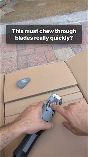 Rusty blade vs. a stack of cardboard