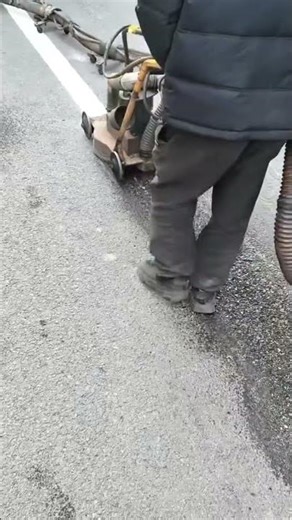 The process of removing a road line using a special machine properly#youtubeshorts #viral