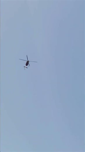 Bell 407 from Manatee county mosquito control low altitude 200 ft