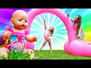 Baby born doll swimming at the swimming pool! Family fun video. Pretend to play. Baby dolls for kids