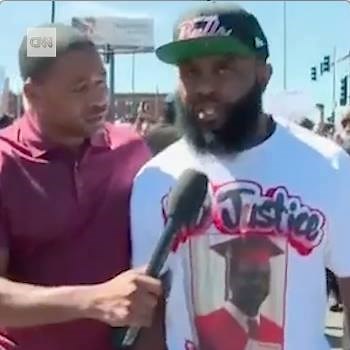 Protesters in Chicago have shut down part of a major interstate during a march against gun violence. CNN's Ryan Young talks to a demonstrator, who says "we need investments in our community." https://cnn.it/2u2W1bT | CNN