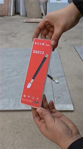 Cutting tiles with a glass cutter...