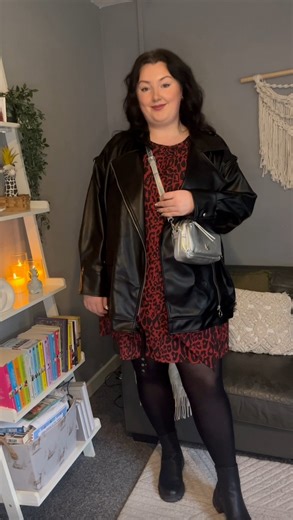 The combo you didn’t know you needed 👀🖤 @curvy_styles_with_chloe pairs our Longline Biker Jacket with our Red Smock Mini dress & we are obsessed! 🤩 | CurveWow