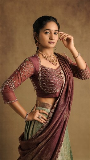 MV Designerstudios on Instagram: "A Sankranthi ensemble designed to be remembered — worn with pride, and cherished like a tradition itself ✨🌾 Concept Inspired by women adorned in heirloom silks, passed down through generations. Fabric Chosen for its graceful fall and ability to age beautifully, just like tradition. Color Story Earth-inspired tones that feel festive, timeless, and rooted. Craft A structured blouse with couture detailing, balanced pleats for fluid movement, and a dupatta draped l