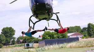 Flying Dutchmen Raise the Bar on Most Pull-ups from a Helicopter in a Minute World Record