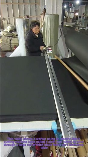 Fabric Cutting Machine in Action：Textile Factory Work