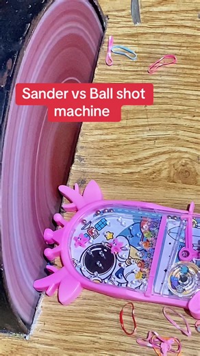 Sander vs Ball Shooting Machine Showdown