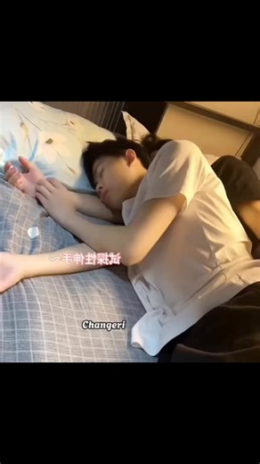 Cuddling Moments of a Chinese Couple at Sleep