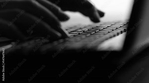 Silhouette video of female hands typing by fingers on netbook keyboard entering a request on the Internet, communicating in social networks, ordering services, working in the office Stock Video