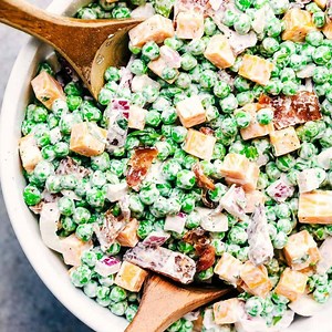 BEST EVER CREAMY PEA SALAD WITH BACON is ALWAYS the potluck favorite! PRINT HERE: https://therecipecritic.com/creamy-pea-salad/ | Tried and True Recipes