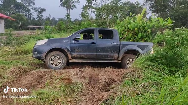 Off-Road Adventure with a Muddy Pickup Truck