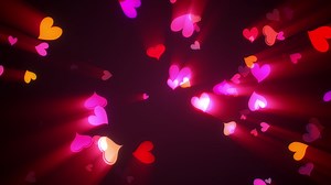 Download Abstract loop flowing down colorful shine heart for free