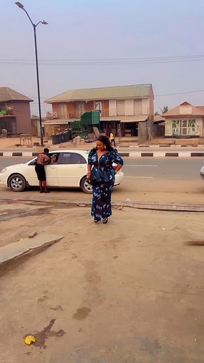 Stylish Street Walk: Woman in Blue Patterned Outfit