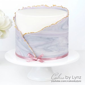 4.2M views · 27K reactions | Have you tried a fondant wrap on your cakes yet? I love this style and I am loving seeing all your cakes using this effect. If you want to give it a try but you're not quite sure how, here is a little sped up sneak peak from a recent video tutorial on the Cakes by Lynz YouTube channel. ⁠ You can watch the full tutorial here ➡ https://youtu.be/39fsz_GOn7o⁠ ⁠ I really hope you like it, let me know what you think! | Cakes by Lynz | Facebook