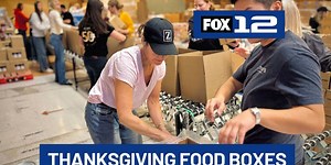 Volunteers help build Thanksgiving food boxes for Portland families