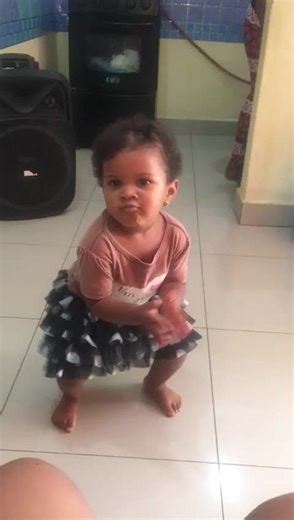 Toddler's Energetic Hand Clapping Performance