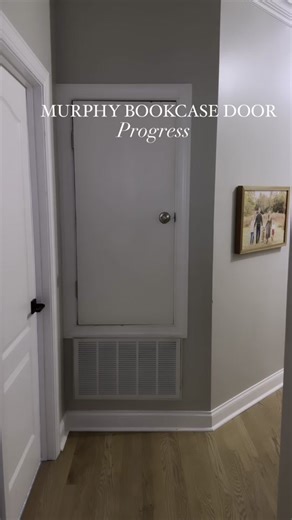 Secret Hidden Bookcase Closet Door, also known as a Murphy door - UPDATE!! This used to be an unused and ugly old water heater closet and it was such a waste of space - so I decided to have some fun with it and make a secret door! In the last couple of day I added the top parts of the trim and did the first coats of paint. I’ll be painting the inside to look like light wood (still need to finish that). Next, I’ll work on the lower part - the ugly vent! I’m thinking of creating some sort of faux 