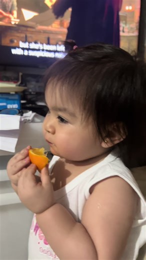 Delightful Moments with a Happy Orange Baby
