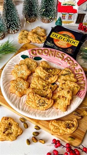 Cookies for Santa, but make them savory! #ad Cheddar cheese shortbread decorated with nuts, herbs and seeds! Packed with bold Old Croc Sharp Cheddar, these savory cookies are crisp, delicious and they melt-in-your mouth! Check out the recipe below, and pick up some Old Croc Cheese to make these tasty snacks! Cheddar Cheese Shortbread Ingredients: 2 cups flour 1/2 tsp salt 1/2 tsp dry mustard 1/2 tsp cayenne 1 cup butter, room temp 7oz Old Croc sharp cheddar cheese, shredded Sesame seeds Fresh ro