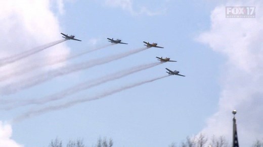 Vintage T-34 planes fly over Fort Custer National Cemetery in Augusta in honor of Memorial Day. | FOX 17