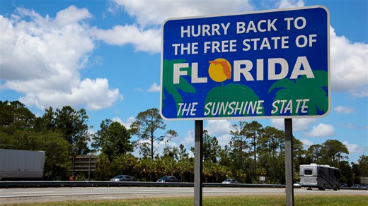 ‘Free State of Florida’ signs now welcome drivers at state line. What we know, and what we don’t