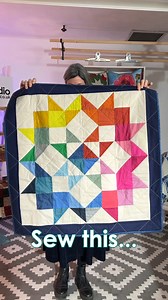 Using ★ RUBY STAR SOCIETY ★ Warp & Weft Charm Pack, Liz made this statement lap quilt for our Charm Pack challenge. Find the pattern here > https://shorturl.at/xzJVU | The Sewing Studio UK