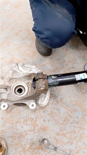 BMW front Wheel shock absorber replacement