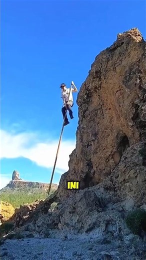 Why Is This Man Jumping Down a Mountain With a Stick? 🤔