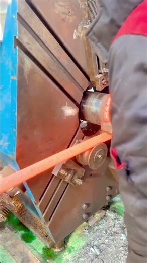 Industrial Hot Metal Coil Bending Machine in Action