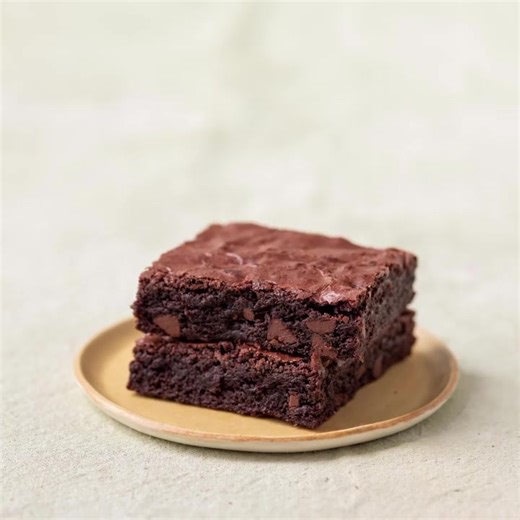 Celebrate World Chocolate Day! Today only: take 15% off nationwide chocolate treats in our Lotsa Chocolate collection at magnoliabakery.com. 🍫🍪 | Magnolia Bakery