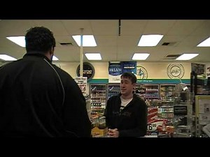 Drunk guy trying to buy beer.