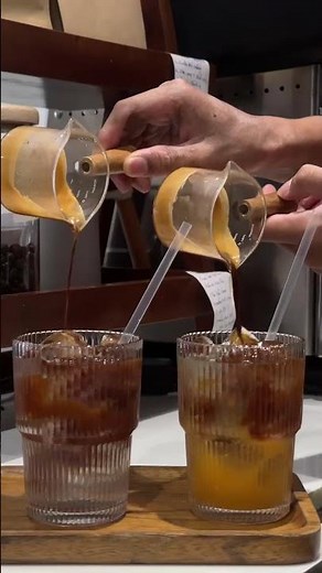 Tropical Americano fr LAM Coffee, with Coconut and Orange juice #arabica #coffeeroastery #nhatrang