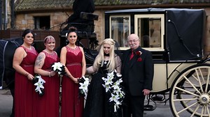 Dying goth bride walks down the aisle at dream Halloween wedding