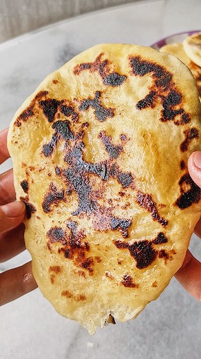 Carolina Gelen on Instagram: "HOMEMADE COCONUT NAAN - I had this exact type of Peshwari Naan at a restaurant, fell in love with it, right before it was removed off the menu. I had to recreate it at home ever since: it’s buttery, fluffy, stuffed with a sweet coconut cardamom filling and so easy to make. Ingredients (6 naans) Dough 1 teaspoon dry yeast 1/2 cup whole milk, lukewarm 1/2 cup full-fat yogurt 2 tablespoons neutral oil, plus more for greasing 2 tablespoons sugar 1 1/2 cups all-purpose f