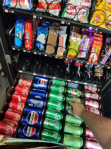Restocking the City Hall Vending Machine with Snacks