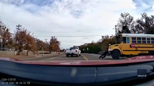 Watch: 'Superman' police officer moves bus