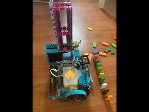 Dominos machine ----LEGO prime spike (building instruction and coding included)