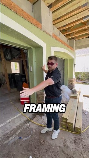 A garage bump-out—engineered framing, tie-in to the roofline, and finishes look original.