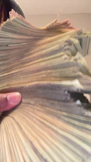 Displaying a Large Stack of U.S. Dollar Bills