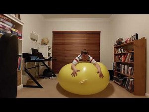 trying and failing to sit on the 55 inch cattex balloon