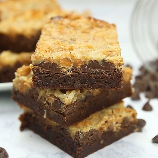 These Magic Layer Brownies are the ultimate decadent dessert! Get the recipe here: https://www.yellowblissroad.com/magic-layer-brownie-bars/ | Yellow Bliss Road