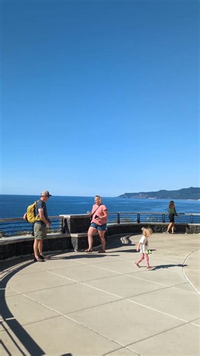 A stunning lighthouse on the Pacific Ocean coast. 4K.