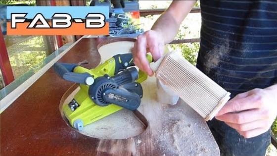 Test Ponceuse à Bande Ryobi EBS800V